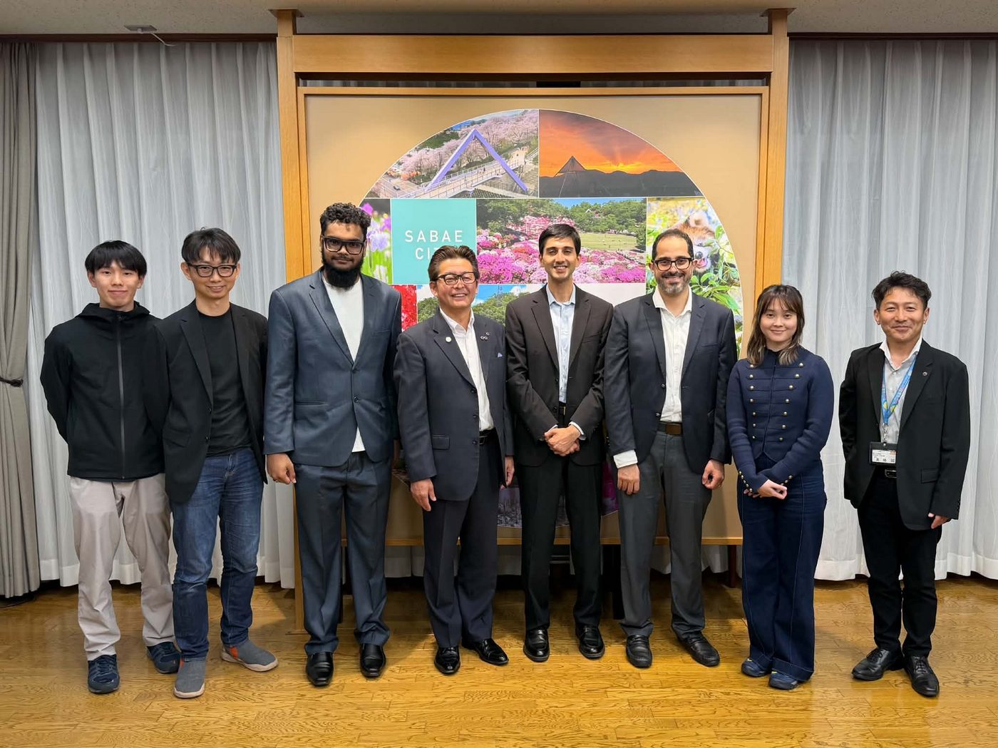 Amil Khanzada with Sabae Mayor Katsuhisa Sasaki and visiting researchers